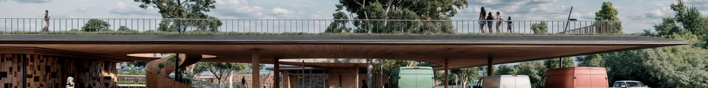 Timber pavilion with a green roof terrace and an open collaborative space.